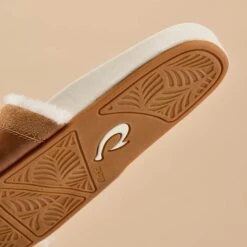 OluKai Hō‘ala Slide - Tan / Puka 18 OluKai Hō‘ala Slide - Tan / Puka -Urban Sneaker Hub 20523 346A 202 69a3cdd4 9046 4a78 92c2 9a28a50f4d39