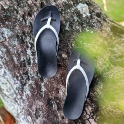 OluKai Ho‘ōpio - White / Onyx 11 OluKai Ho‘ōpio - White / Onyx -Urban Sneaker Hub Ho opio White galleryimage 03 5b3aec00 2b00 4140 a4d2 af17cfd5f04e